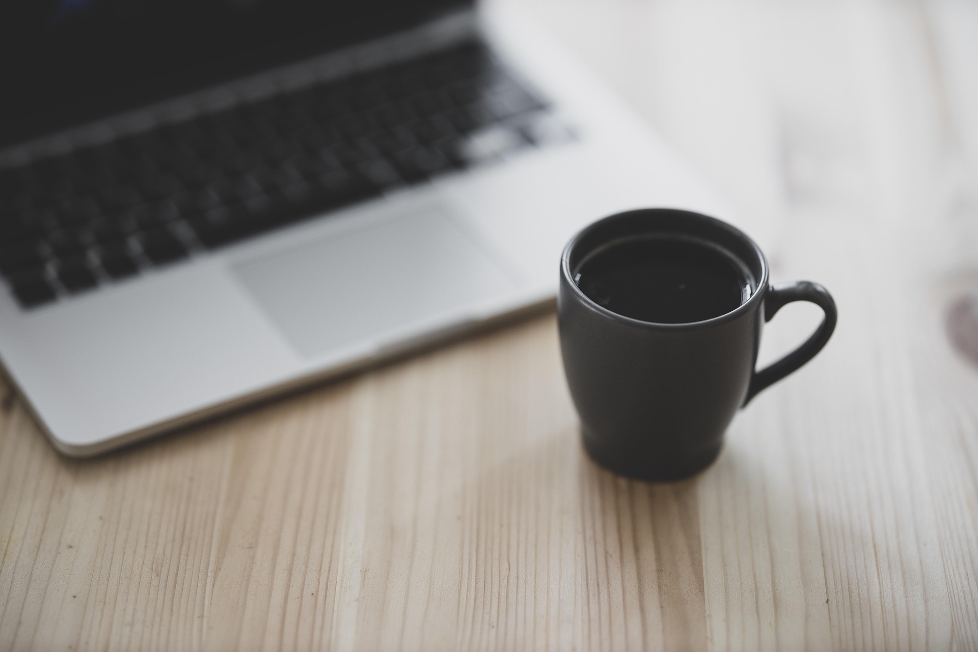 laptop and a cup